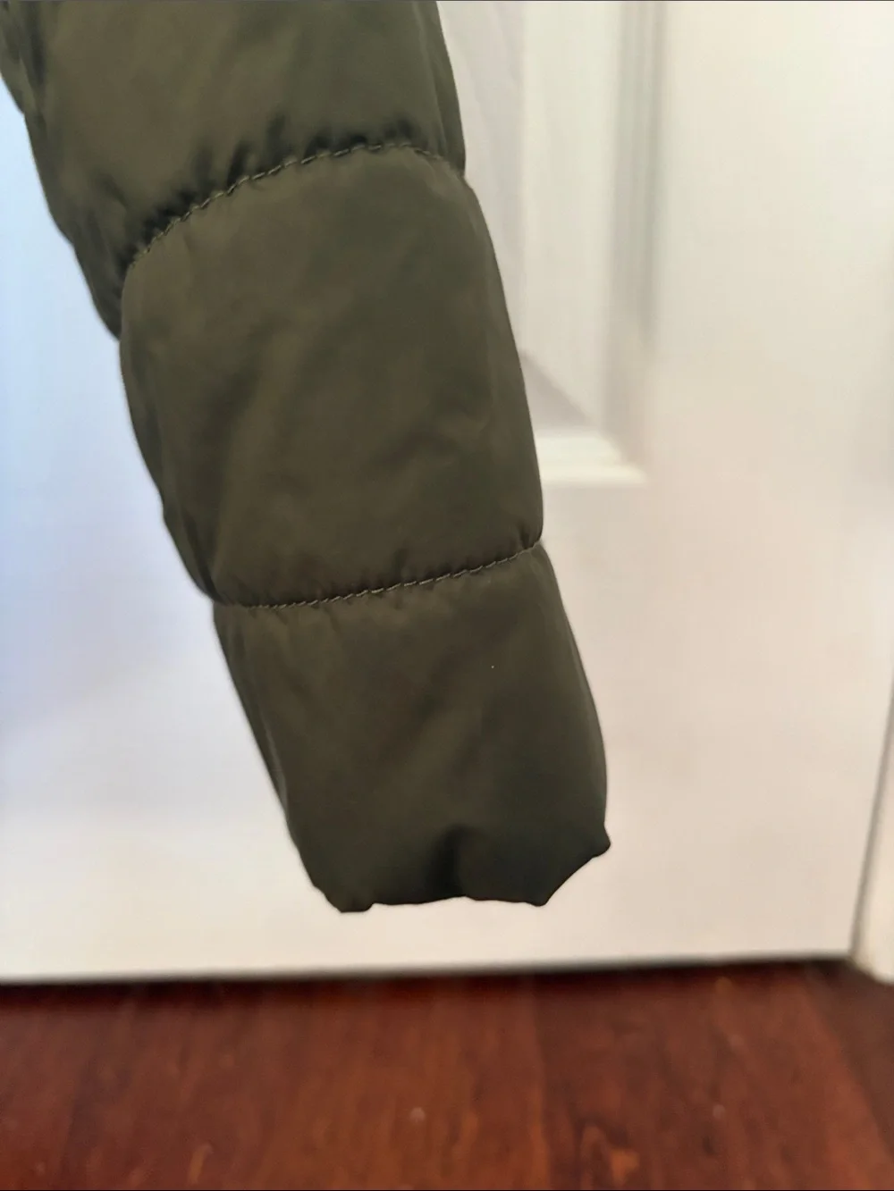 The North Face Boy’s Olive and Black Quilted Puffer Jacket with Hood